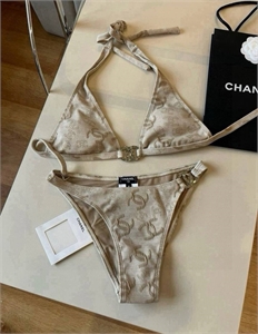{{productViewItem.photos[photoViewList.activeNavIndex].Alt || productViewItem.photos[photoViewList.activeNavIndex].Description || 'Купальник CHANEL'}}