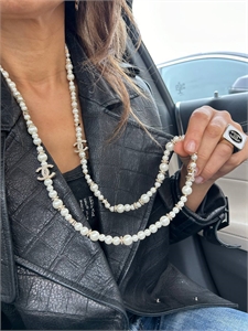 {{productViewItem.photos[photoViewList.activeNavIndex].Alt || productViewItem.photos[photoViewList.activeNavIndex].Description || 'Бусы CHANEL'}}