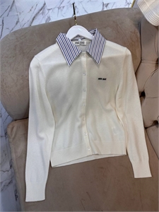 {{productViewItem.photos[photoViewList.activeNavIndex].Alt || productViewItem.photos[photoViewList.activeNavIndex].Description || 'Кардиган MIU MIU'}}