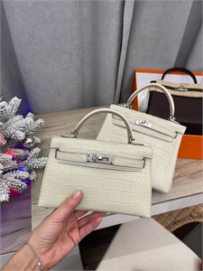 {{productViewItem.photos[photoViewList.activeNavIndex].Alt || productViewItem.photos[photoViewList.activeNavIndex].Description || 'Сумка HERMES Kelly Mini'}}