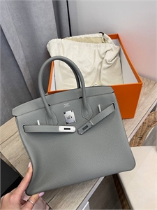 {{productViewItem.photos[photoViewList.activeNavIndex].Alt || productViewItem.photos[photoViewList.activeNavIndex].Description || 'Сумка Hermes Birkin 30 см'}}