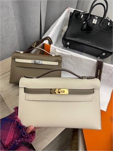 {{productViewItem.photos[photoViewList.activeNavIndex].Alt || productViewItem.photos[photoViewList.activeNavIndex].Description || 'Сумка Hermes Kelly'}}