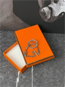 {{productViewItem.photos[photoViewList.activeNavIndex].Alt || productViewItem.photos[photoViewList.activeNavIndex].Description || 'Брелок HERMES'}}