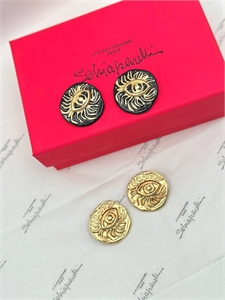 {{productViewItem.photos[photoViewList.activeNavIndex].Alt || productViewItem.photos[photoViewList.activeNavIndex].Description || 'Серьги Schiaparelli'}}