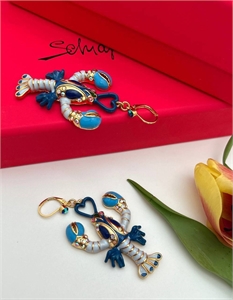 {{productViewItem.photos[photoViewList.activeNavIndex].Alt || productViewItem.photos[photoViewList.activeNavIndex].Description || 'Серьги Schiaparelli'}}
