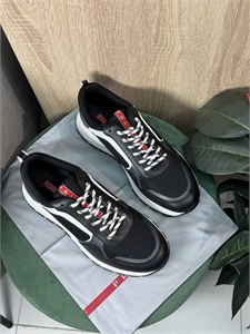 {{productViewItem.photos[photoViewList.activeNavIndex].Alt || productViewItem.photos[photoViewList.activeNavIndex].Description || 'Кроссовки PRADA'}}