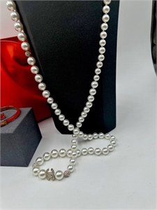 {{productViewItem.photos[photoViewList.activeNavIndex].Alt || productViewItem.photos[photoViewList.activeNavIndex].Description || 'Бусы CHANEL 130 см'}}