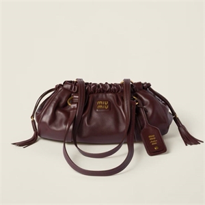 {{productViewItem.photos[photoViewList.activeNavIndex].Alt || productViewItem.photos[photoViewList.activeNavIndex].Description || 'Сумка MIU MIU'}}