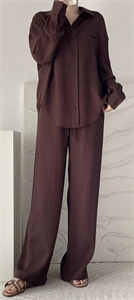 {{productViewItem.photos[photoViewList.activeNavIndex].Alt || productViewItem.photos[photoViewList.activeNavIndex].Description || 'Костюм THE ROW'}}
