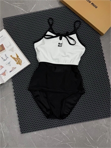 {{productViewItem.photos[photoViewList.activeNavIndex].Alt || productViewItem.photos[photoViewList.activeNavIndex].Description || 'Купальник MIU MIU'}}