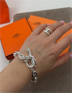 {{productViewItem.photos[photoViewList.activeNavIndex].Alt || productViewItem.photos[photoViewList.activeNavIndex].Description || 'Кольцо Hermes'}}