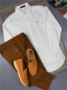 {{productViewItem.photos[photoViewList.activeNavIndex].Alt || productViewItem.photos[photoViewList.activeNavIndex].Description || 'Рубашка ZEGNA'}}
