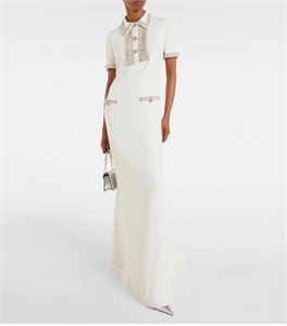 {{productViewItem.photos[photoViewList.activeNavIndex].Alt || productViewItem.photos[photoViewList.activeNavIndex].Description || 'Платье VALENTINO'}}