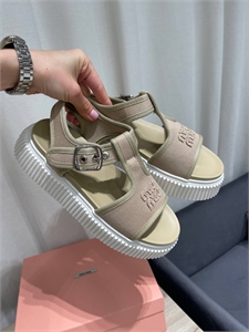 {{productViewItem.photos[photoViewList.activeNavIndex].Alt || productViewItem.photos[photoViewList.activeNavIndex].Description || 'Сандалии MIU MIU'}}