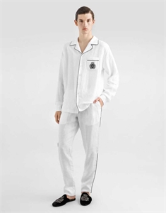 {{productViewItem.photos[photoViewList.activeNavIndex].Alt || productViewItem.photos[photoViewList.activeNavIndex].Description || 'Костюм из льна DG'}}