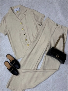 {{productViewItem.photos[photoViewList.activeNavIndex].Alt || productViewItem.photos[photoViewList.activeNavIndex].Description || 'Костюм Schiaparelli'}}