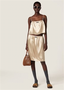 {{productViewItem.photos[photoViewList.activeNavIndex].Alt || productViewItem.photos[photoViewList.activeNavIndex].Description || 'Костюм MIU MIU'}}