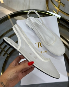 {{productViewItem.photos[photoViewList.activeNavIndex].Alt || productViewItem.photos[photoViewList.activeNavIndex].Description || 'Балетки THE ROW'}}