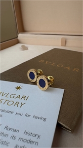 {{productViewItem.photos[photoViewList.activeNavIndex].Alt || productViewItem.photos[photoViewList.activeNavIndex].Description || 'Серьги BVLGARI'}}