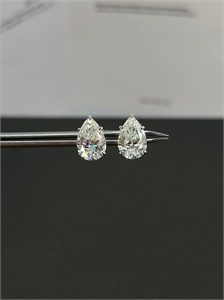 {{productViewItem.photos[photoViewList.activeNavIndex].Alt || productViewItem.photos[photoViewList.activeNavIndex].Description || 'Бриллиантовые серьги GRAFF'}}