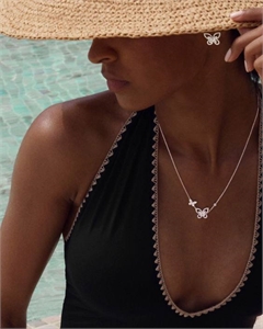 {{productViewItem.photos[photoViewList.activeNavIndex].Alt || productViewItem.photos[photoViewList.activeNavIndex].Description || 'Кулон GRAFF'}}